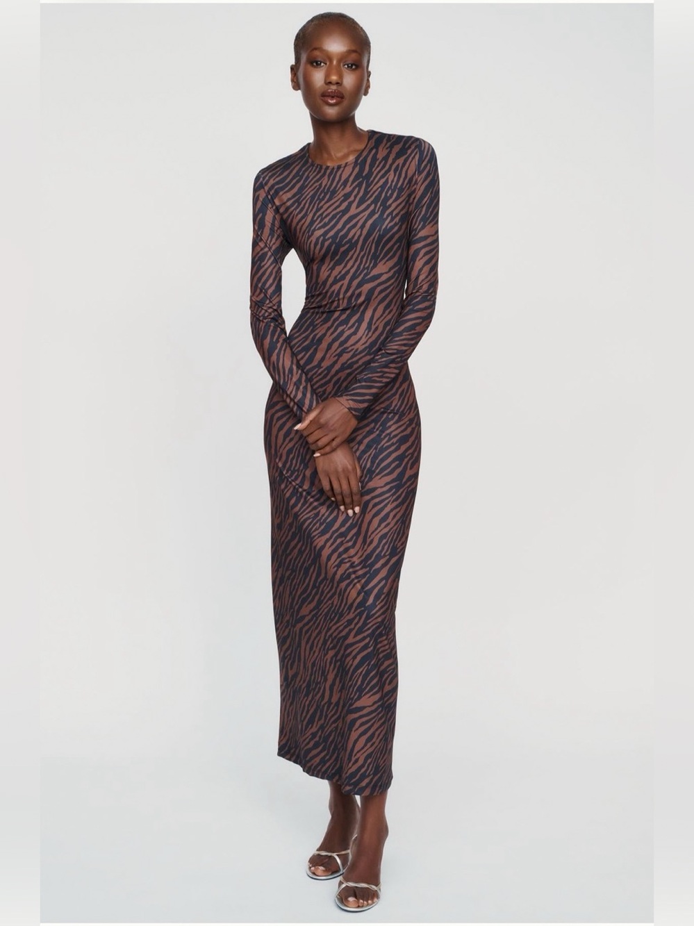 NWT Anthropologie Slim Knit Madi Dress in black and brown zebra print. Size S.